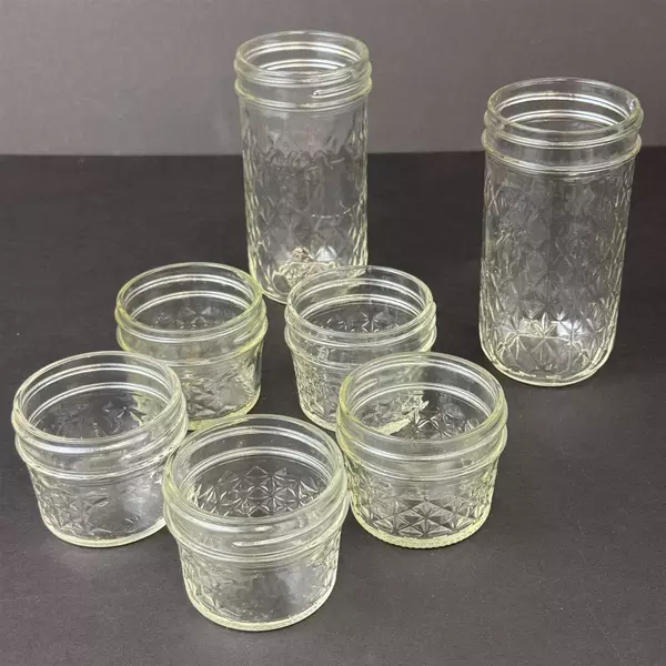 Lot of 7 Canning Jars Five 4 Ounce And Two 12 Ounce Quilted Jelly No Lids