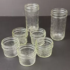 Lot of 7 Canning Jars Five 4 Ounce And Two 12 Ounce Quilted Jelly No Lids