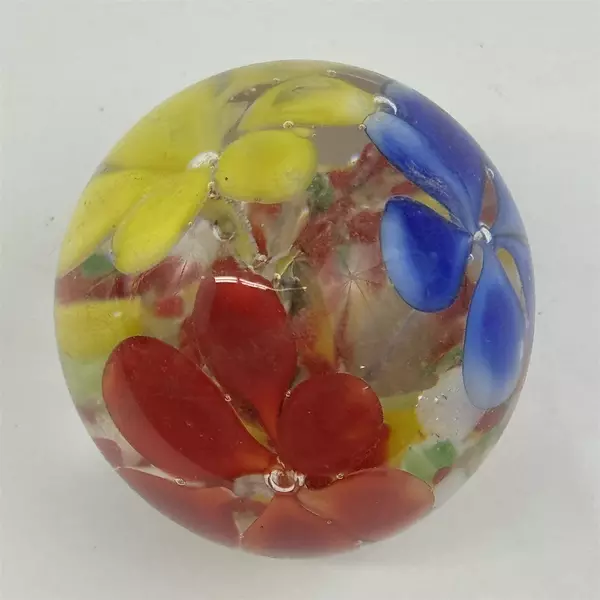 Small Blown Art Glass Paperweight With Red Yellow And Blue Flowers