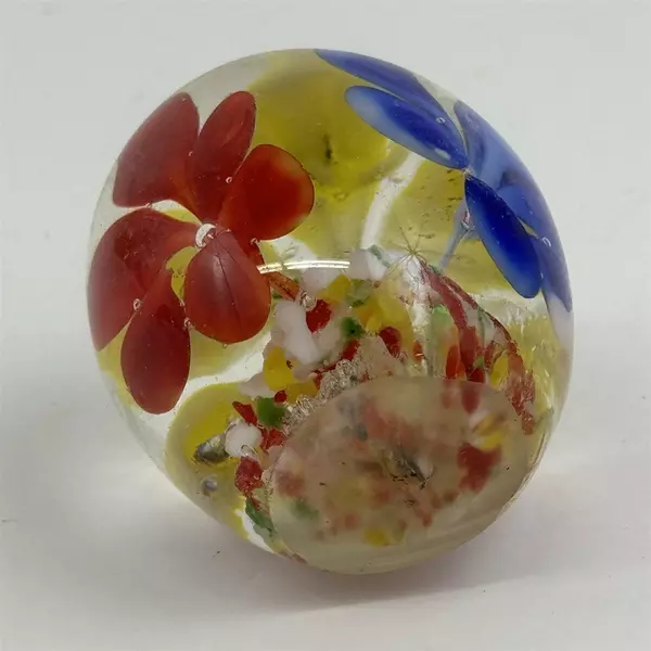 Small Blown Art Glass Paperweight With Red Yellow And Blue Flowers