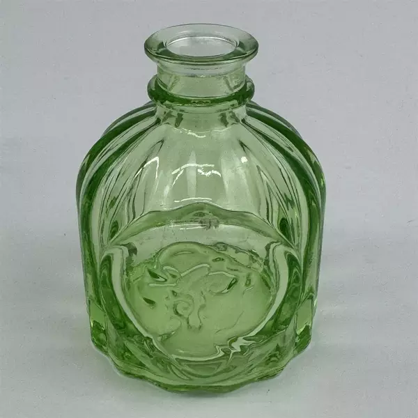Vtg Mini Light Green Colored Glass Round Apothecary Bottle Embossed Woman's Head