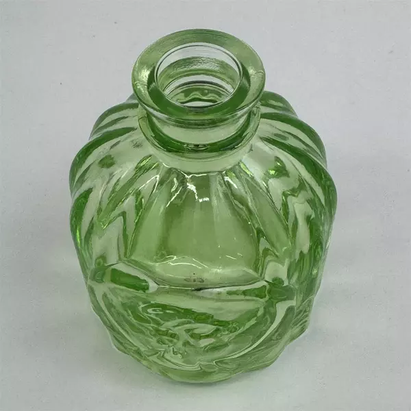 Vtg Mini Light Green Colored Glass Round Apothecary Bottle Embossed Woman's Head