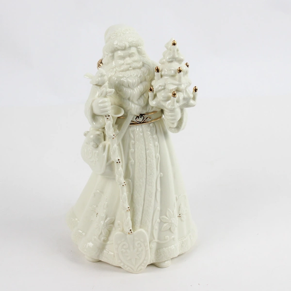 Unbranded Santa Holding Tree and Shovel Figurine Ivory with Gold Trim 10in Tall
