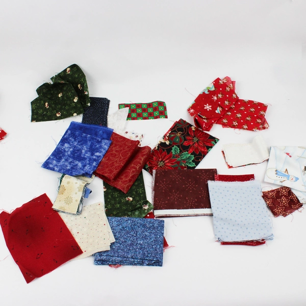 1.7 Lb Lot of Christmas Themed Quilting Fabric Scraps