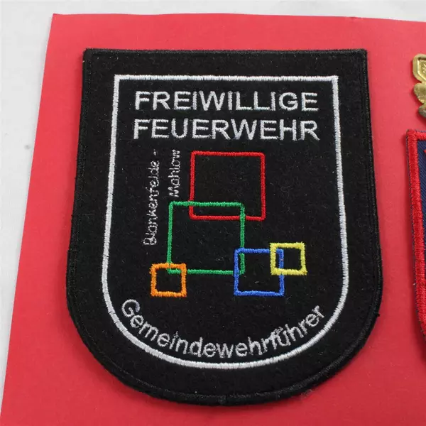 Framed German Volunteer Fire Brigade 'Freiwillige Feuerwehr' Patches & Medal