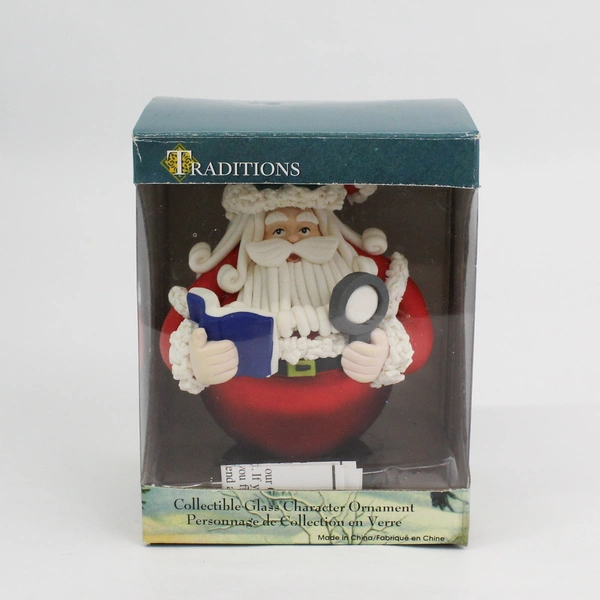 Traditions Collectible Glass Ornament Santa With Book And Magnifying Glass