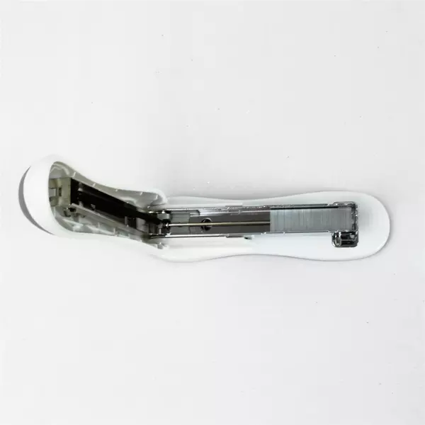 Gray & white 5" Ergonomic Desktop Stapler with Opened Box of Boston Staples