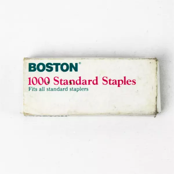 Gray & white 5" Ergonomic Desktop Stapler with Opened Box of Boston Staples