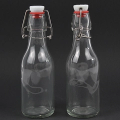 Lot Of 2 Yeboda Clear Glass Bottles With Swing Top Lid 7.75" Tall