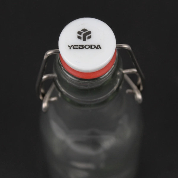 Lot Of 2 Yeboda Clear Glass Bottles With Swing Top Lid 7.75" Tall