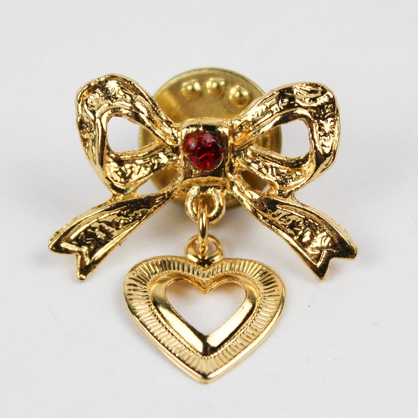 Vintage Gold-Tone Bow with Dangling Heart Red Stone Lapel Pin