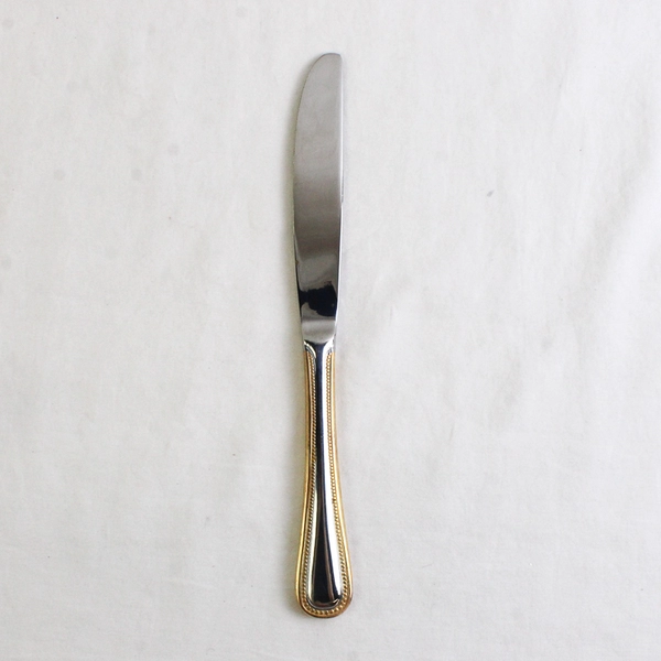 A Wallace Silver Regal Pearl Gold Accent Front/Back Dinner Knife 8.75" Good