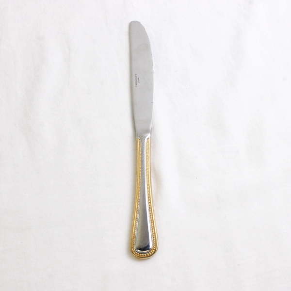 A Wallace Silver Regal Pearl Gold Accent Front/Back Dinner Knife 8.75" Good
