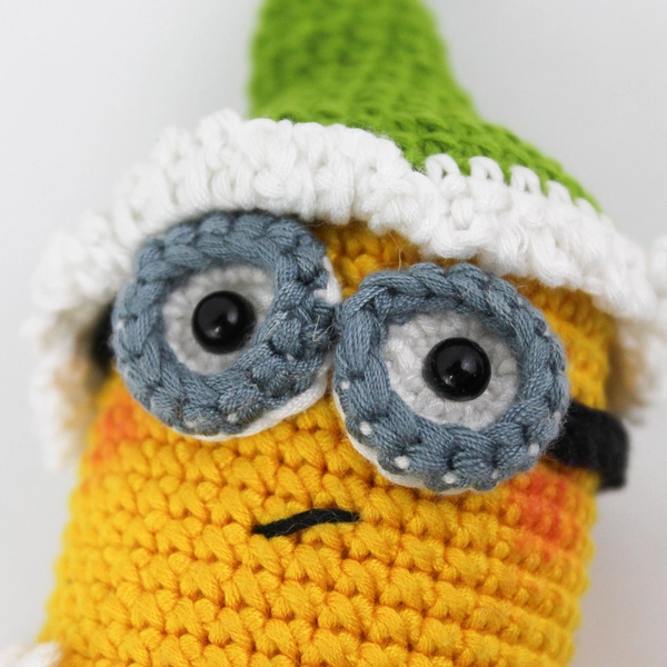 Crocheted Minion Kevin In Green Santa Suit