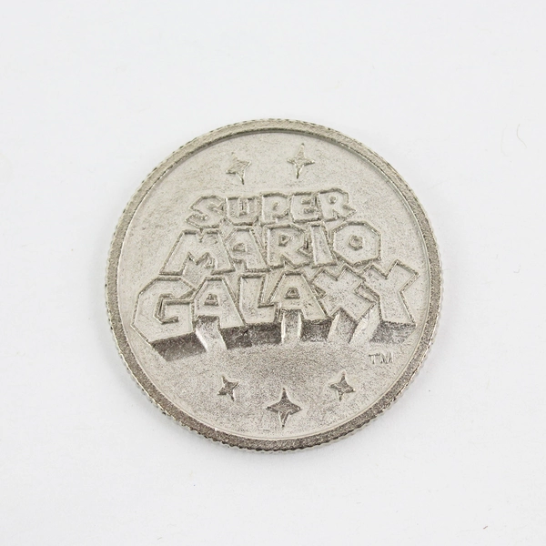 Nintendo Wii Super Mario Galaxy Commemorative Launch Coin and COA