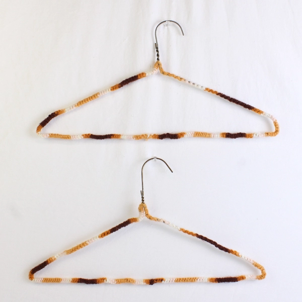 Lot of 5 Metal Hangers With Crocheted Covers Various Colors