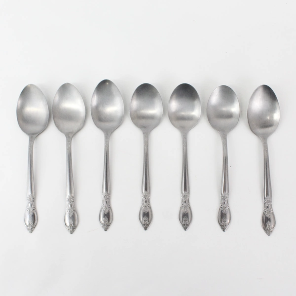 Set of 7 Rogers Co. RG1 Stainless Tablespoons Floral Center