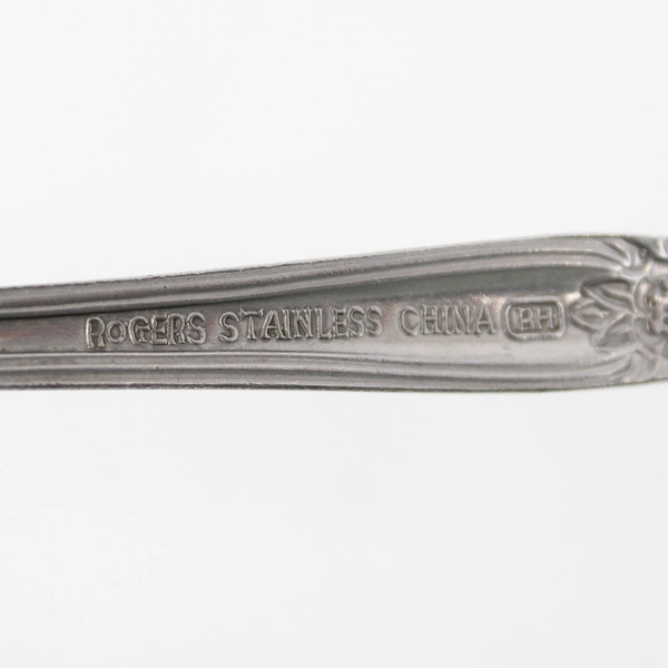 Set of 7 Rogers Co. RG1 Stainless Tablespoons Floral Center