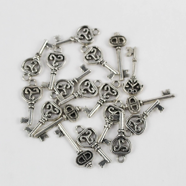 Lot of 20 Miniature Plastic Skeleton Key Charms for Crafts