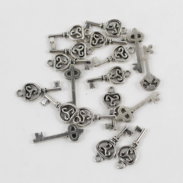 Lot of 20 Miniature Plastic Skeleton Key Charms for Crafts