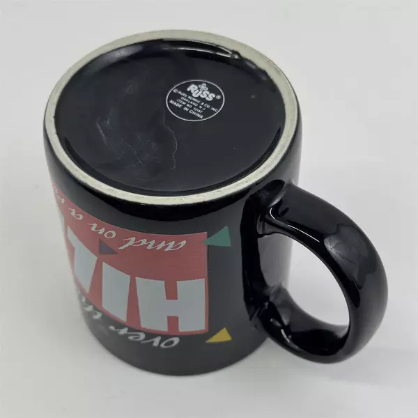 Russ Berrie & Co Inc "Over The Hill And On A Roll" Black Ceramic Mug 3.75" Tall