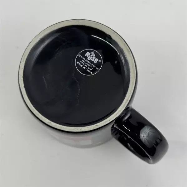 Russ Berrie & Co Inc "Over The Hill And On A Roll" Black Ceramic Mug 3.75" Tall