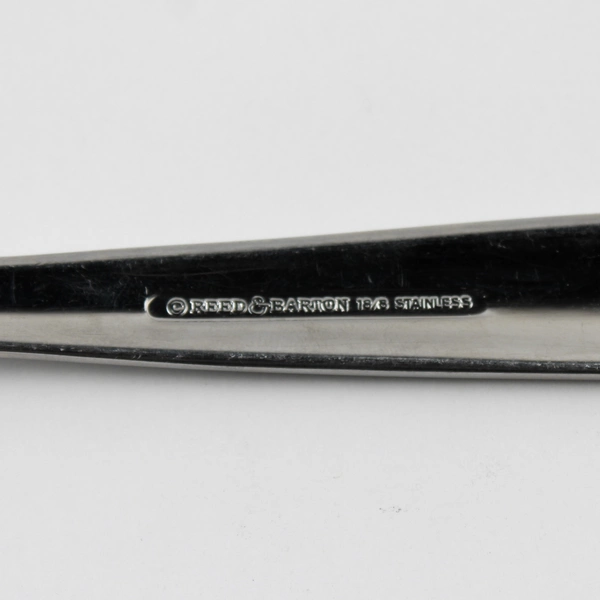 A Reed & Barton 18/8 Stainless Durham-Matte Pierced Serving Spoon 8.75 Inches