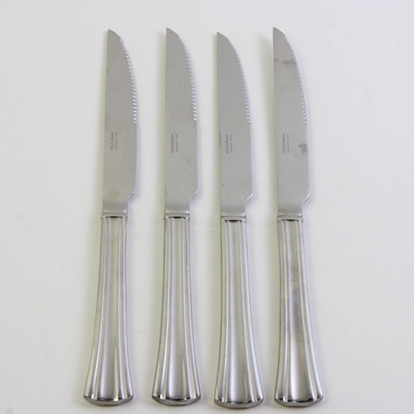 A Set of 4 Reed & Barton Brookshire Stainless Solid Handle Steak Knives 9.75 In