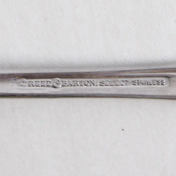 A Reed & Barton Select East Hampton Pattern Sugar Spoon Stainless 6.25 Inches
