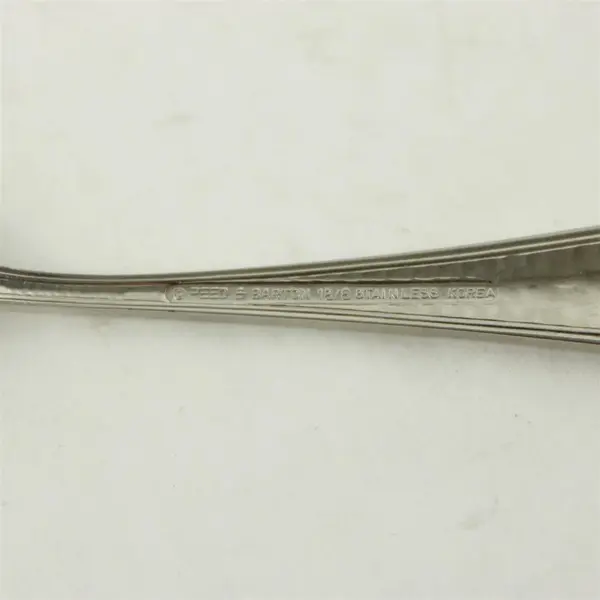 Reed & Barton Dorado Sugar Shell Stainless Steel Spoon 6.25"