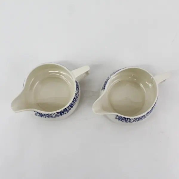 2 Vintage White Ceramic Creamers With Blue Flowers 