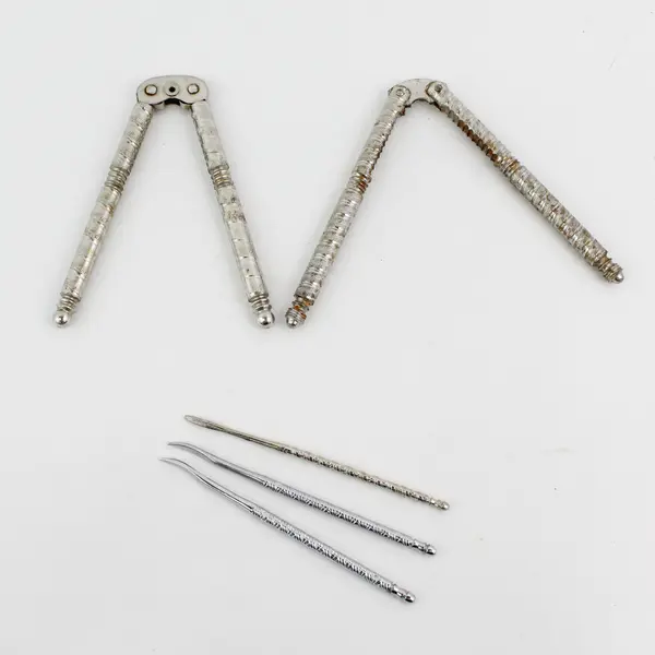 2 Metal Nutcrackers With 3 Picks