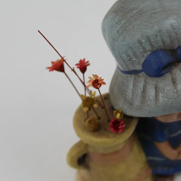 Vintage Victorian Girl With a Pitcher Of Flowers Ceramic Figurine 