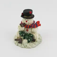 Resin Snowman Cutting Down A Christmas Tree Figurine