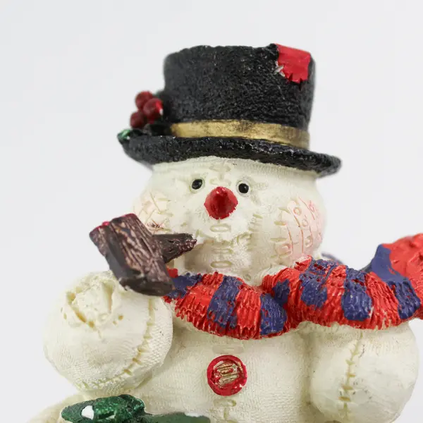 Resin Snowman Cutting Down A Christmas Tree Figurine