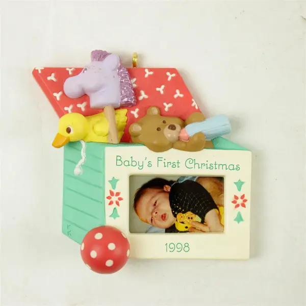 1998 Hallmark Keepsake Baby's First Christmas Photo Holder Ornament