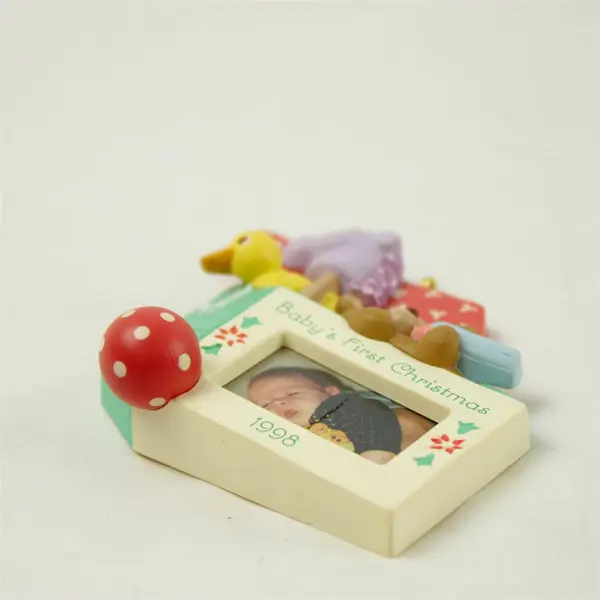 1998 Hallmark Keepsake Baby's First Christmas Photo Holder Ornament
