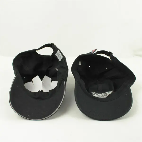 Lot of 2 Adjustable Baseball Caps Both Black DEI & Rol Wheels