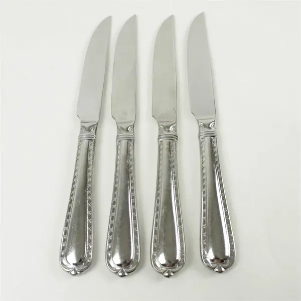 Set of 4 Hampton Silversmiths Nobility Stainless Solid Handle Steak Knives
