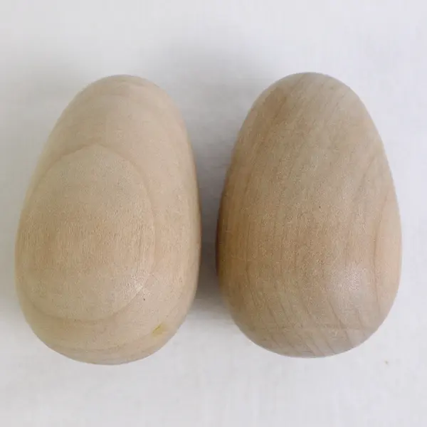 Lot Of 4 Unbranded Decorative Eggs (2 Ceramic Painted Beige, 2  Solid Wooden)
