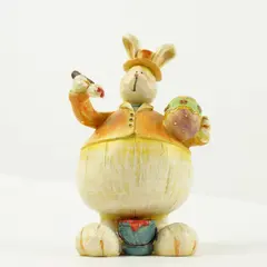 Easter Bunny Figurine Orange Jacket Holding Painted Egg Collectible
