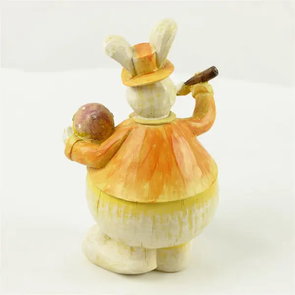 Easter Bunny Figurine Orange Jacket Holding Painted Egg Collectible