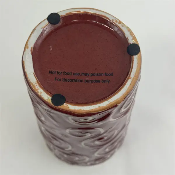 Cranberry Red Ceramic Vase With Embossed White Swirls 9"