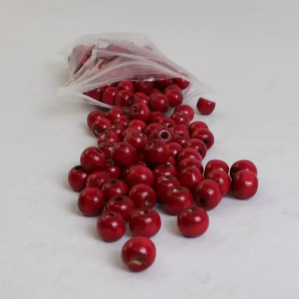 Bag of Cranberry-Red Wooden Round Beads, Circa. 50 