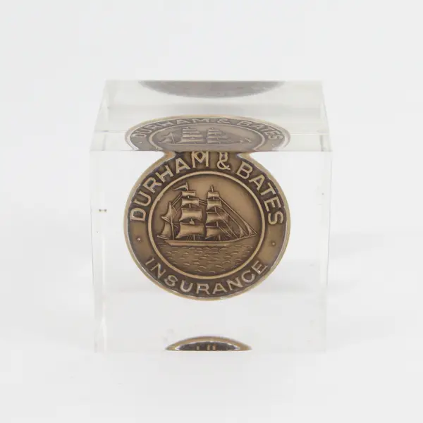Durham Bates Insurance Bronze Token In Lucite Paperweight