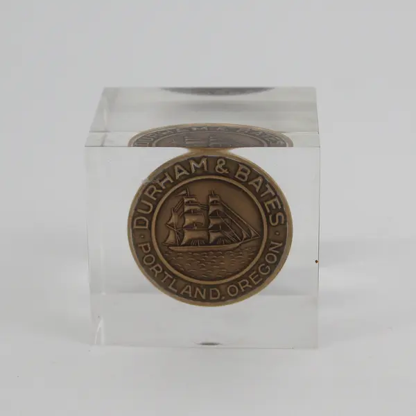 Durham Bates Insurance Bronze Token In Lucite Paperweight