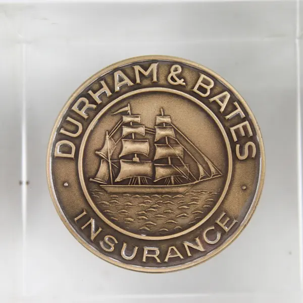 Durham Bates Insurance Bronze Token In Lucite Paperweight
