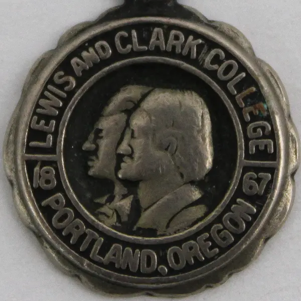 Vintage Lewis & Clark College 1967 Silver Figural Charm Pendant