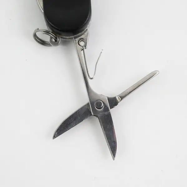 Black Pen Knife With A Single Blade, File, Scissors, Flashlight