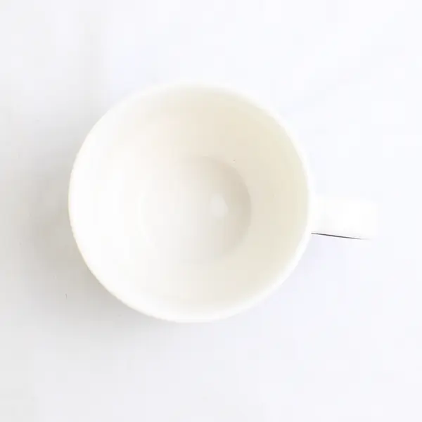 2007 Starbucks Mug with Writing Across Brown and White 13 fl oz.